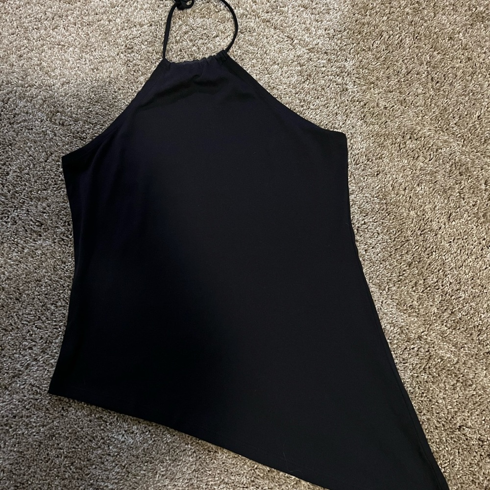 Black tank top with adjustable behind-the-neck tie.